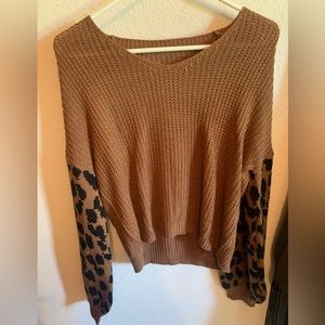 Brown leopard sweater size small. From a local boutique